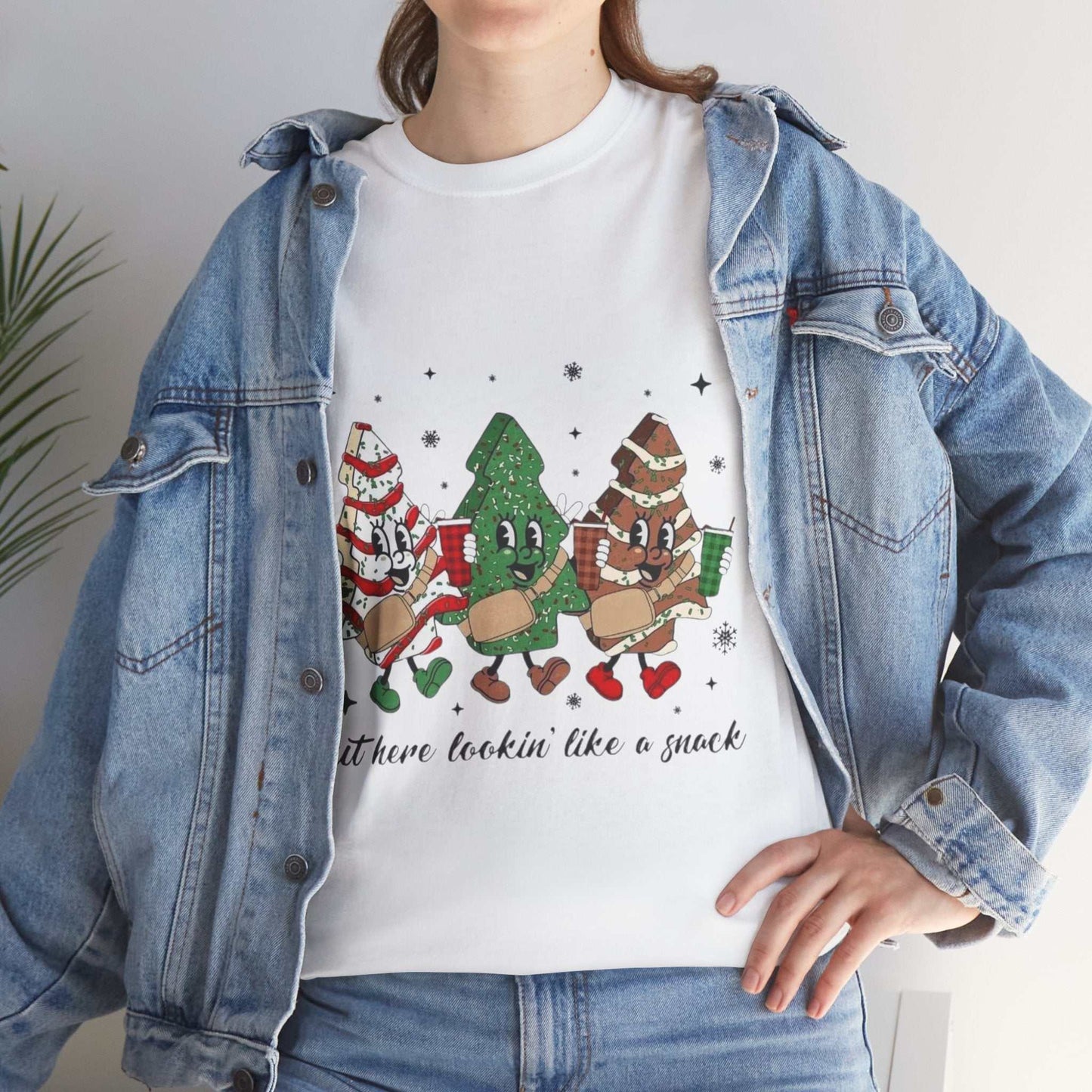 Unisex t-shirt with Christmas-themed snack design, perfect for holiday parties.