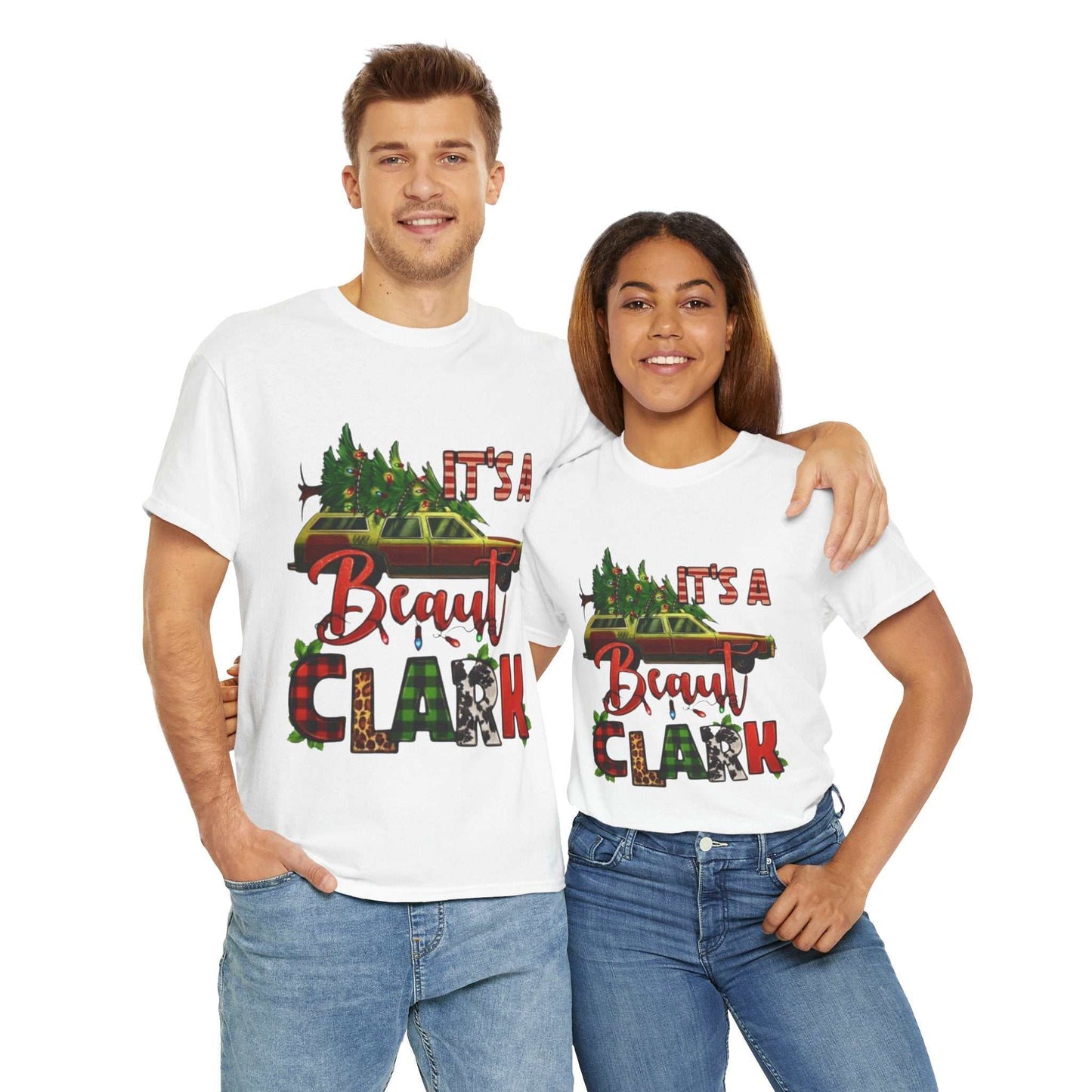 Its A Beaut Clark Christmas Shirt worn by a smiling couple, featuring a retro holiday design inspired by National Lampoon's Christmas Vacation.