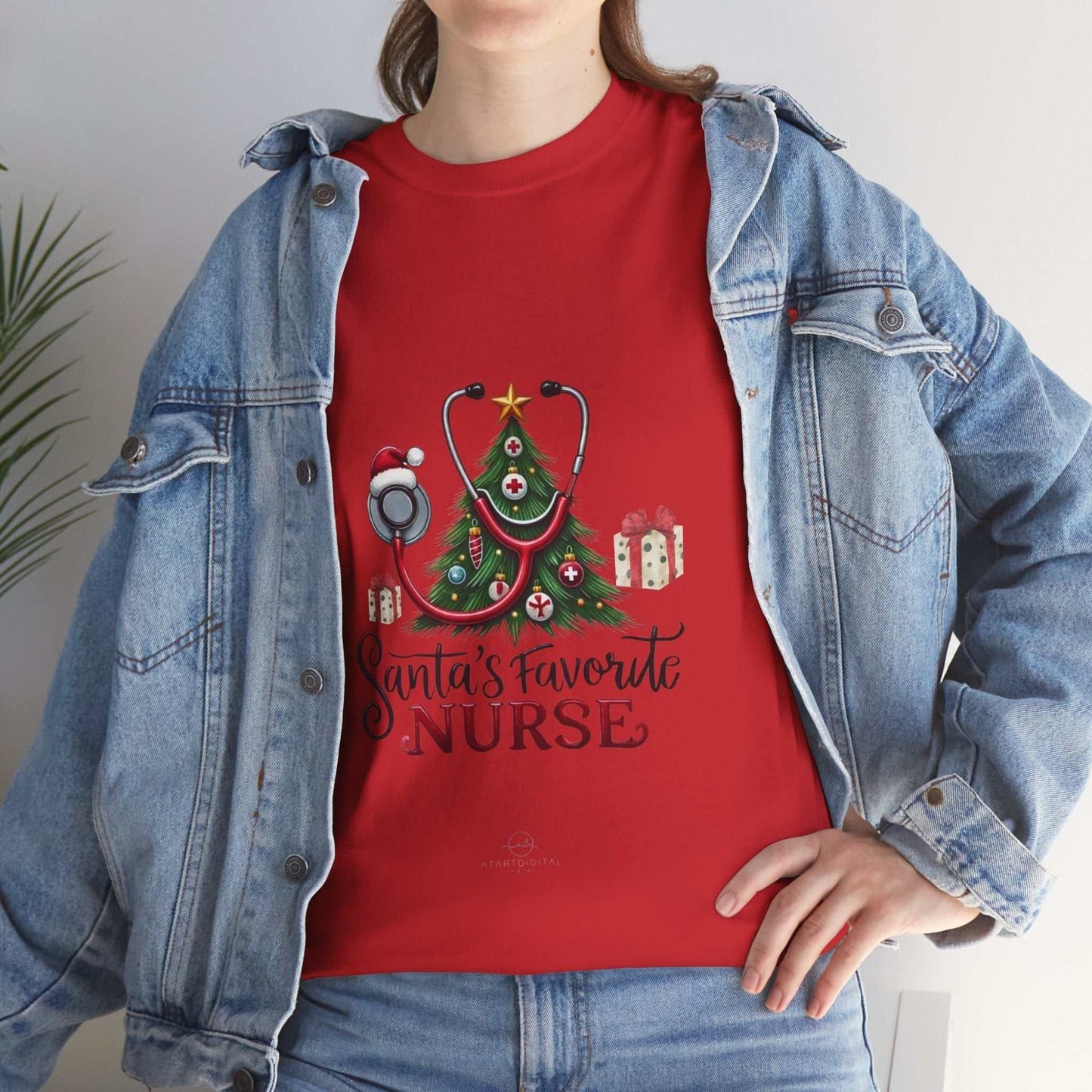 Santas Favorite Nurse Shirt, Christmas gift for nurses, festive red tee with holiday design.