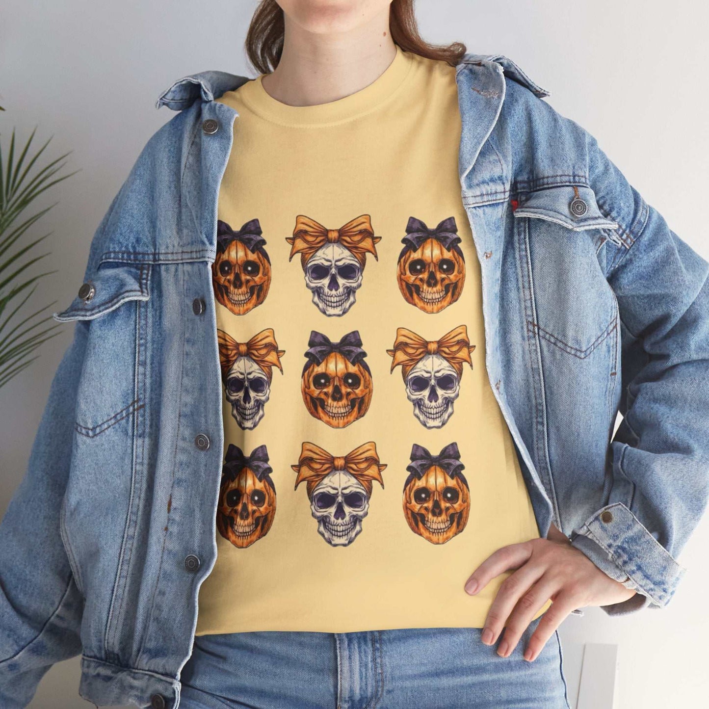 Unisex Halloween Skull Shirt with bow-tie skeleton design, ideal for spooky season.