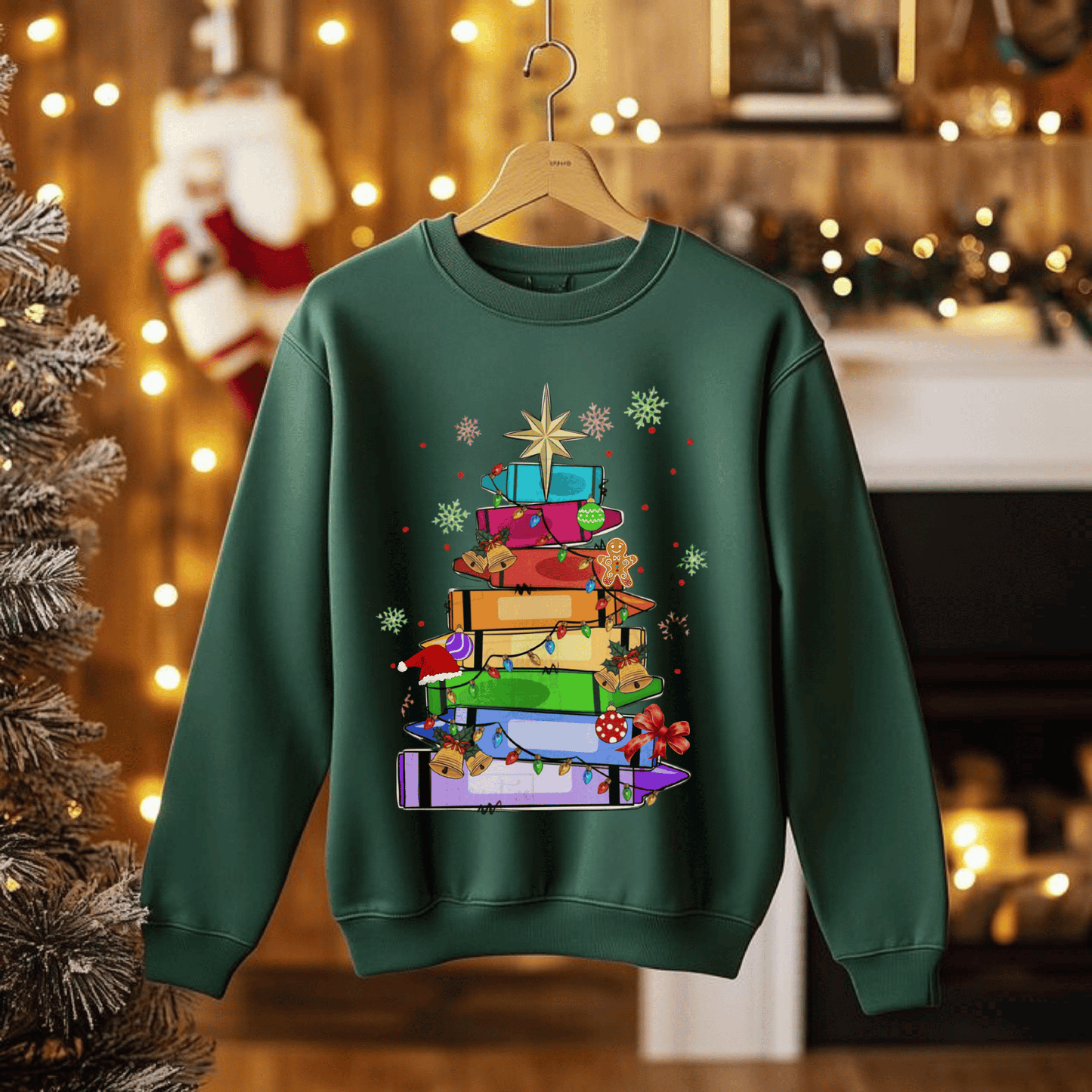 Crayons Christmas tree sweatshirt in cozy holiday setting, ideal teacher team gift.
