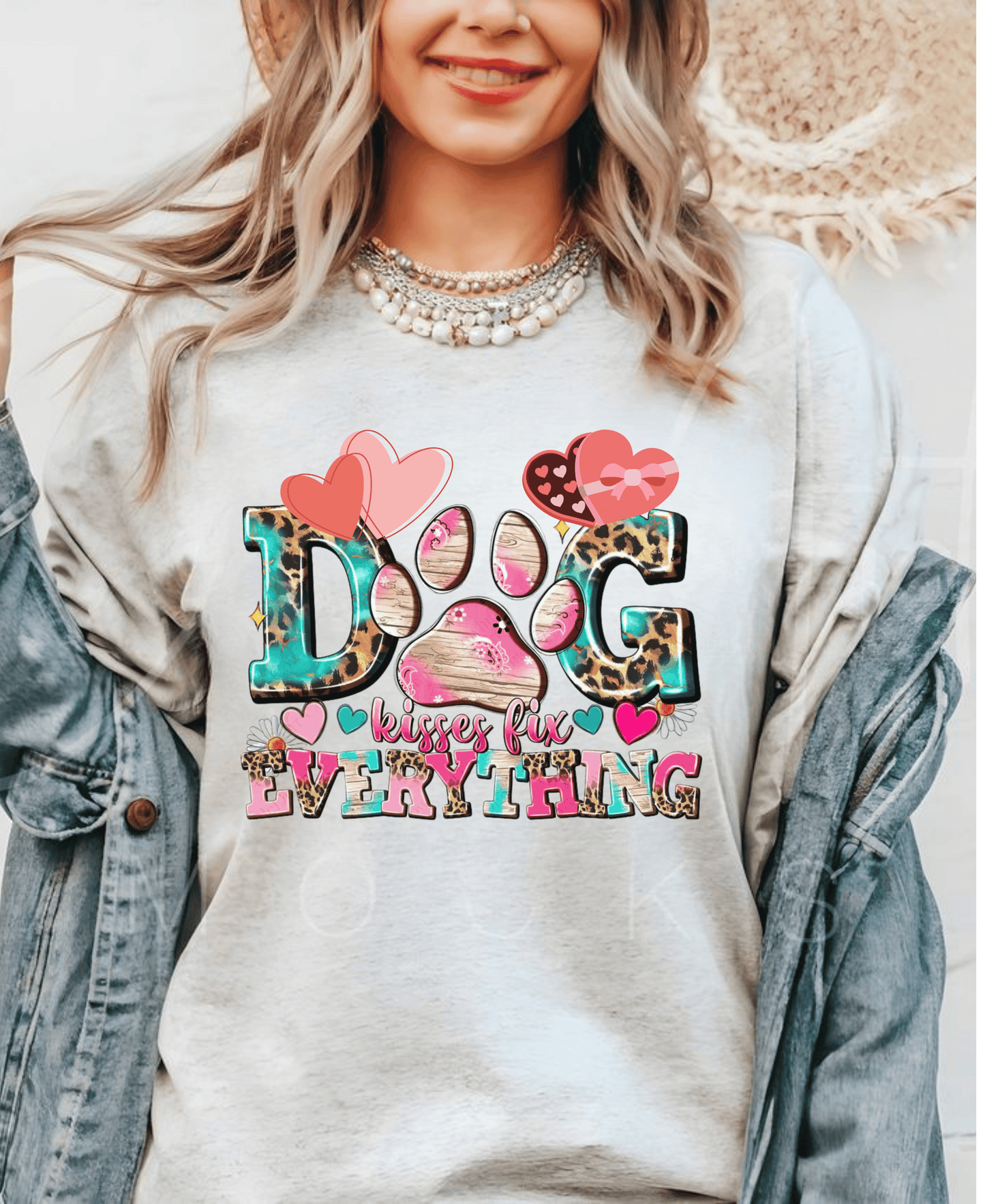 Dog Kisses Fix Everything T-Shirt featuring heart and paw designs for dog lovers.