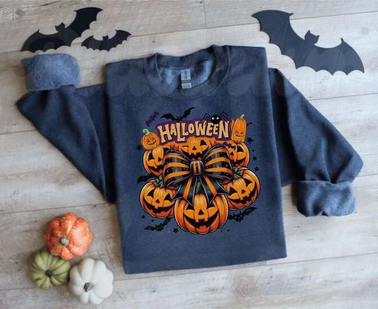 Halloween Sweatshirt – Cozy and stylish retro pumpkin design for Halloween lovers. The perfect Halloween Gift for this fall season.