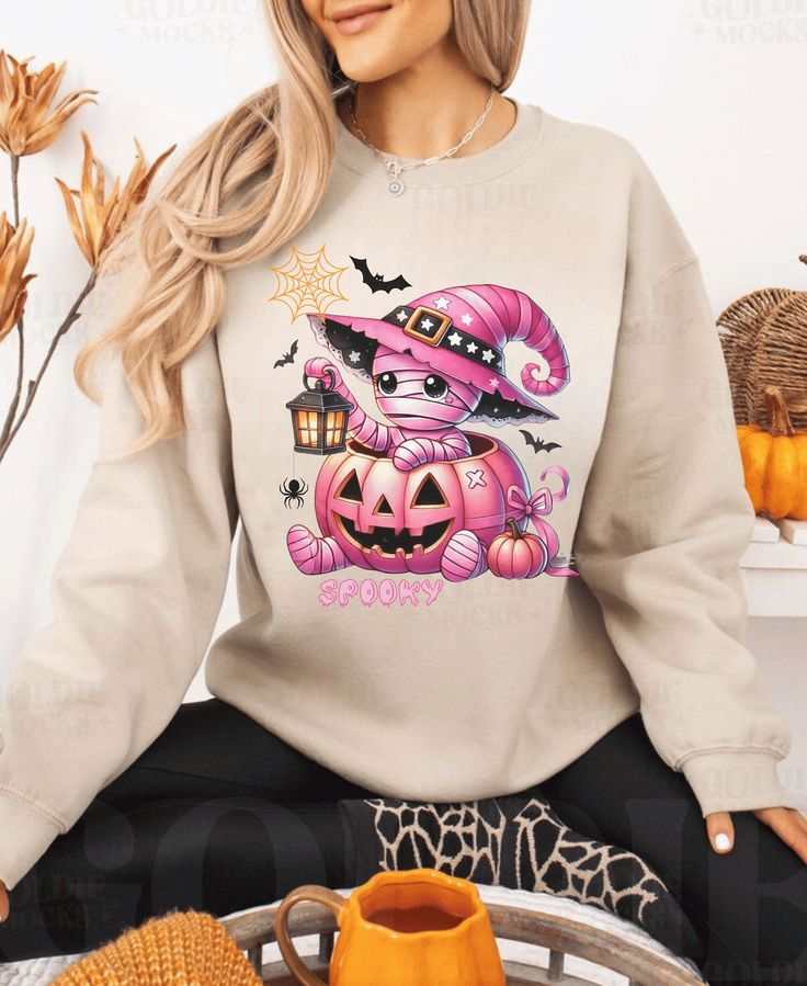 Funny kids Halloween sweatshirt with spooky pumpkin and ghost design.