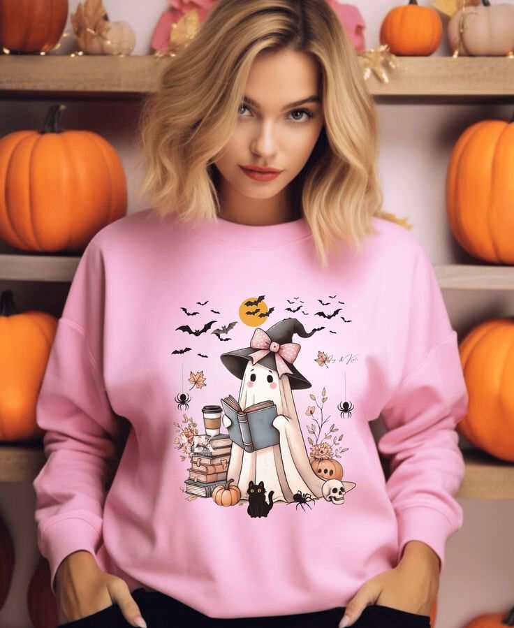 Ghost book sweatshirt with Halloween design, featuring a ghost reading with coffee, surrounded by pumpkins.