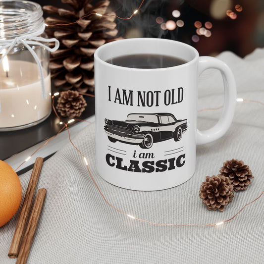 Classic car enthusiast ceramic mug with vintage design and glossy finish.