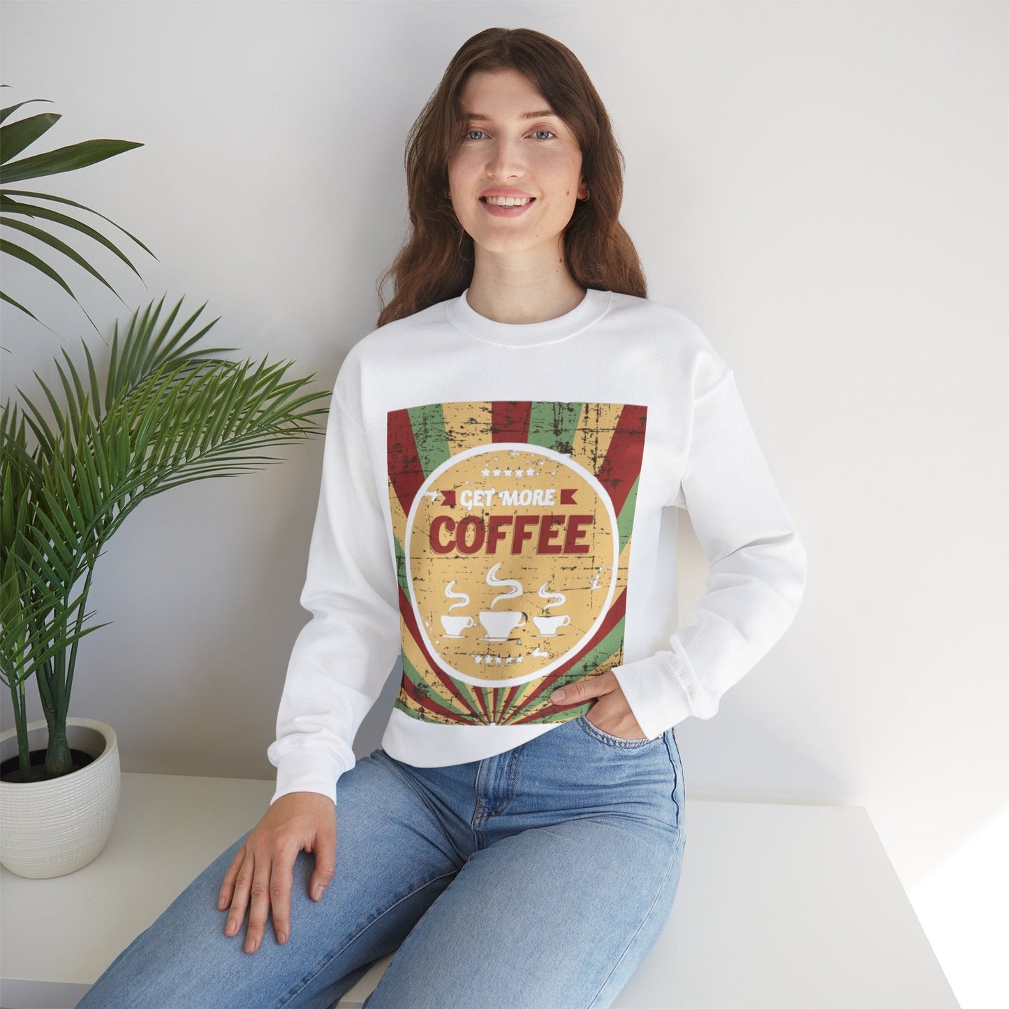 Unisex crewneck sweatshirt with "Get More Coffee" design, perfect for coffee lovers seeking cozy, stylish apparel.