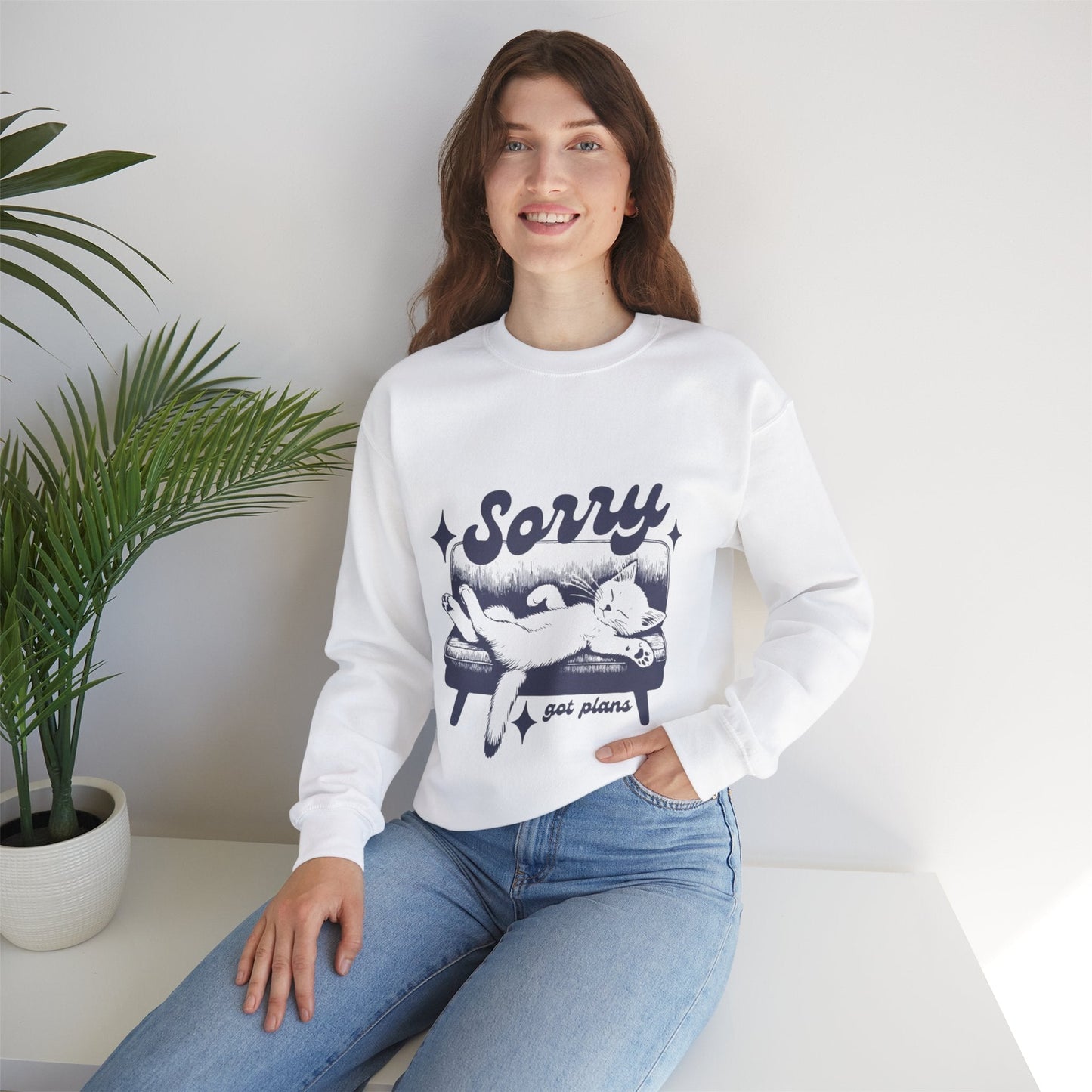 Unisex crewneck sweatshirt with "Sorry I've Got Plans" design.