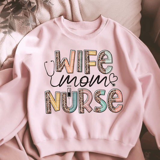 Celebrate hWife Mom Nurse Sweatshirter strength with the Wife Mom Nurse Sweatshirt. Soft, durable & heartfelt. A perfect gift for the healthcare hero in your life.