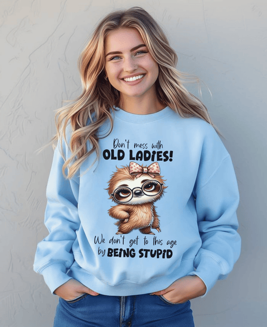 Funny sloth sweatshirt for old ladies -  "Don't Mess with Old Ladies" sloth crewneck sweatshirt – funny gift for moms or grandmas with a cute sloth graphic and bold lettering