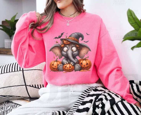 Funny Elephant Halloween Sweetshirt featuring a cute elephant with pumpkins, ideal for spooky season and elephant lovers.