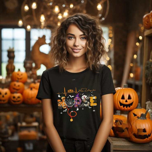 Halloween Nurse T-shirt with pumpkin graphic in spooky setting.
