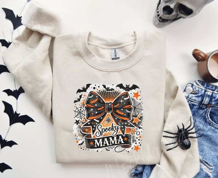 Spooky Mama Halloween sweatshirt with bow design, perfect for spooky season vibes.