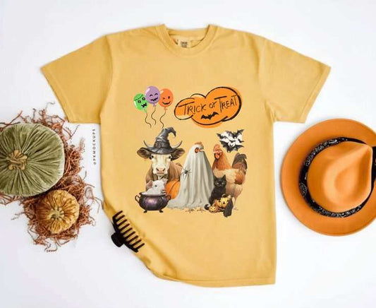 Trick or Treat Halloween Shirt with festive animal design, spooky season gift, yellow tee.